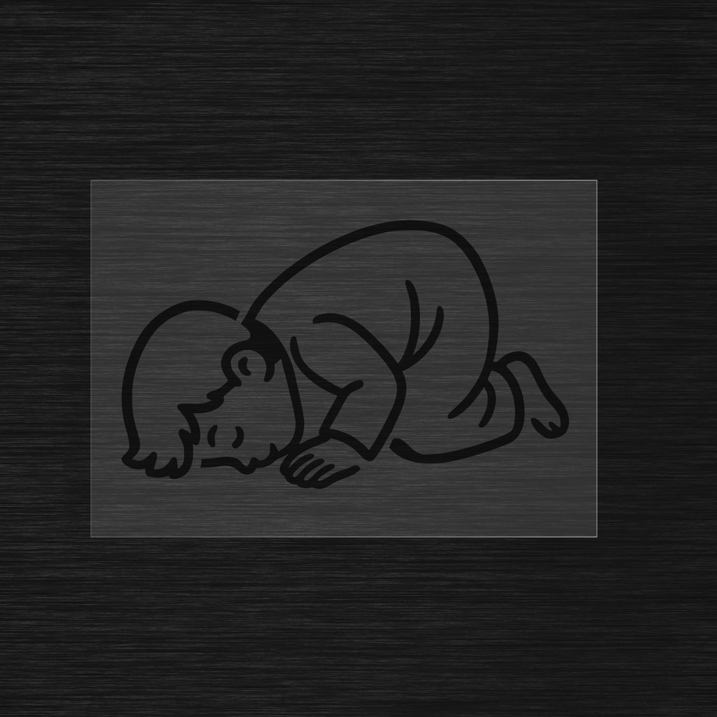 Boy in the sujood prostration position during Islamic prayer