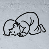 Boy in the sujood prostration position during Islamic prayer